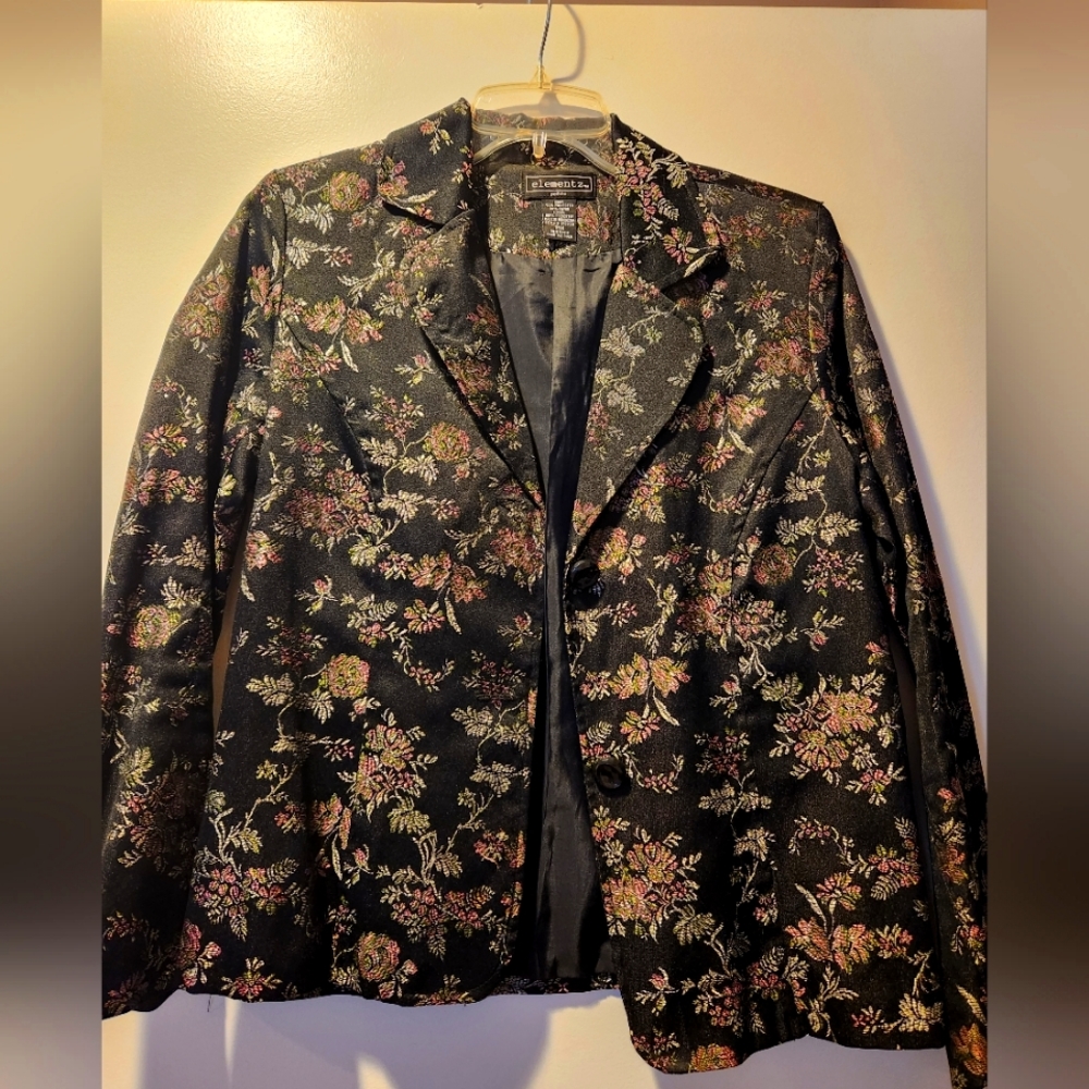 Floral jacket. Black with pink/green accents. Size PM.